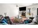 Inviting living room with stone fireplace, plush seating, and neutral color palette at 4689 Shire Dr, Lithonia, GA 30038