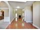 Bright living room with hardwood floors, fireplace, and large windows offering natural light at 1544 English Manor Cir, Stone Mountain, GA 30087