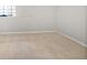 A bedroom featuring carpeting, natural light, and neutral wall color at 1704 Golf Link Dr, Stone Mountain, GA 30088
