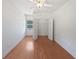 Bright bedroom with hardwood floors and built-in closet at 1704 Golf Link Dr, Stone Mountain, GA 30088
