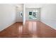 This living room has hardwood floors and large window for natural light at 1704 Golf Link Dr, Stone Mountain, GA 30088