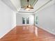 The main bedroom has hardwood floors and tray ceilings at 1704 Golf Link Dr, Stone Mountain, GA 30088