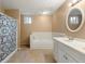 Bathroom featuring a shower-tub combination and large vanity with double sinks at 3923 Lookout Point Dr, Marietta, GA 30066