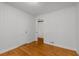 Cozy bedroom with hardwood floors, white walls, and closets at 404 Bridlewood Cir, Decatur, GA 30030