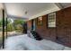 Spacious carport with brick wall, offering convenient covered parking at 404 Bridlewood Cir, Decatur, GA 30030