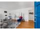 Bright living room with hardwood floors, stylish furniture, and a view of the front door at 404 Bridlewood Cir, Decatur, GA 30030
