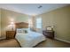 Serene bedroom with a plush bed, classic wooden furniture, and natural light at 5251 Amberbrook Ct, Marietta, GA 30068
