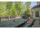 Outdoor patio area for entertaining, surrounded by a lush, green landscape at 5251 Amberbrook Ct, Marietta, GA 30068