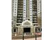 Upscale condo building featuring private balconies and inviting entrance at 795 Hammond Dr # 1908, Atlanta, GA 30328