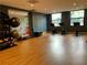 Gym featuring free weights, exercise balls and three stationary bikes with large windows at 795 Hammond Dr # 1908, Atlanta, GA 30328