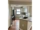Kitchen featuring stainless steel appliances, light countertops, and a modern faucet at 795 Hammond Dr # 1908, Atlanta, GA 30328