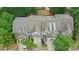 Aerial view of townhomes surrounded by lush green trees at 1491 Bellsmith Dr, Alpharetta, GA 30076