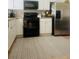 Well-maintained kitchen features white cabinetry, stainless steel appliances, and a tile backsplash at 1491 Bellsmith Dr, Alpharetta, GA 30076