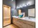Gray bathroom featuring double sinks, modern fixtures, and walk in shower at 195 Arizona Ne Ave # 203, Atlanta, GA 30307