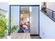 Bright bedroom featuring sliding glass doors and stairs nearby at 195 Arizona Ne Ave # 203, Atlanta, GA 30307