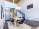 Dining room area showcasing table with seating, modern lighting, and view into bedroom through sliding glass doors at 195 Arizona Ne Ave # 203, Atlanta, GA 30307