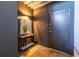 Stylish entryway with concrete floors, modern light fixture, and contemporary wall art at 195 Arizona Ne Ave # 203, Atlanta, GA 30307