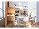 Bright kitchen with stainless steel appliances, island with seating, and modern fixtures at 195 Arizona Ne Ave # 203, Atlanta, GA 30307