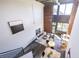 Modern living area with high ceilings, exposed brick, and stylish furnishings at 195 Arizona Ne Ave # 203, Atlanta, GA 30307