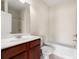 Well-appointed bathroom featuring a vanity with sink, bathtub, and shower, offering a relaxing and functional space at 282 Autry Mill Ln, Suwanee, GA 30024