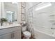 Clean bathroom featuring a tub, shower, vanity, and neutral decor that offers a serene and relaxing atmosphere at 2860 Windsor Knoll Dr, Dacula, GA 30019