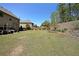 A sprawling backyard offering ample space and a well-maintained lawn at 3798 Spring Place Ct, Loganville, GA 30052