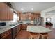 Beautiful kitchen featuring wood cabinets, stainless steel appliances and granite countertops at 3798 Spring Place Ct, Loganville, GA 30052
