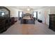 Spacious main bedroom with tray ceiling, ceiling fan, and carpeted flooring at 3798 Spring Place Ct, Loganville, GA 30052