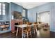 Elegant dining room with a fireplace, bookshelves, and view into the living room at 836 Dill Sw Ave, Atlanta, GA 30310