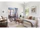 Bright living room with hardwood floors, a comfortable sofa, and stylish decor with view into dining room at 836 Dill Sw Ave, Atlanta, GA 30310