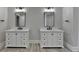Bright bathroom featuring dual vanities and contemporary black fixtures at 870 Longstone Lndg, Alpharetta, GA 30022