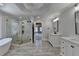 Luxurious bathroom with a stand-alone tub and large walk-in shower at 870 Longstone Lndg, Alpharetta, GA 30022