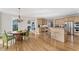 Kitchen features hardwood floors, a center island, and stainless steel appliances at 870 Longstone Lndg, Alpharetta, GA 30022