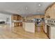 Spacious kitchen with island, stainless steel appliances, and granite countertops at 870 Longstone Lndg, Alpharetta, GA 30022