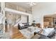Spacious living room has hardwood floors, a fireplace, and plenty of natural light at 870 Longstone Lndg, Alpharetta, GA 30022