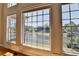 This home offers a lake view from the living space and the tall windows illuminate the space at 870 Longstone Lndg, Alpharetta, GA 30022