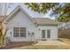 Back of home and patio, ideal for relaxing or entertaining guests in a serene outdoor setting at 1052 Pike Forest Ct, Lawrenceville, GA 30045