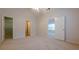Bedroom featuring multiple doorways showcasing the layout and access to other rooms at 1052 Pike Forest Ct, Lawrenceville, GA 30045