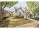 Beautiful home with a manicured lawn and attractive landscaping, enhancing its curb appeal at 1052 Pike Forest Ct, Lawrenceville, GA 30045