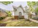Beautiful home with a manicured lawn and attractive landscaping, enhancing its curb appeal at 1052 Pike Forest Ct, Lawrenceville, GA 30045