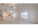 A large living room featuring tall ceilings and upstairs views at 1052 Pike Forest Ct, Lawrenceville, GA 30045