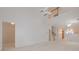 A bright living room space with access to other rooms in the house at 1052 Pike Forest Ct, Lawrenceville, GA 30045