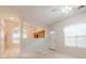Spacious living room features pass-through to eat-in kitchen and vaulted ceilings at 1052 Pike Forest Ct, Lawrenceville, GA 30045