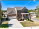 Aerial view of a stunning home showcasing its architectural design and landscaped surroundings at 1060 Crescent Ridge Dr, Buford, GA 30518