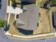 Overhead of the house, highlighting the landscaped yard, patio, and the surrounding neighborhood at 1060 Crescent Ridge Dr, Buford, GA 30518