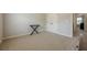 Carpeted bedroom with neutral walls, offering a flexible space at 1060 Crescent Ridge Dr, Buford, GA 30518
