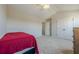 Bedroom featuring neutral walls, carpet, and vaulted ceilings at 1060 Crescent Ridge Dr, Buford, GA 30518