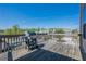 Outdoor deck overlooking green trees under a bright blue sky at 1060 Crescent Ridge Dr, Buford, GA 30518