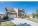 Charming brick-front home with a well-maintained lawn, two-car garage, and inviting front porch at 1060 Crescent Ridge Dr, Buford, GA 30518