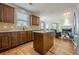 Well-designed kitchen with a kitchen island, granite countertops, and stainless steel appliances at 1060 Crescent Ridge Dr, Buford, GA 30518